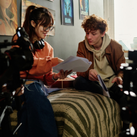 Young people discussing a film project